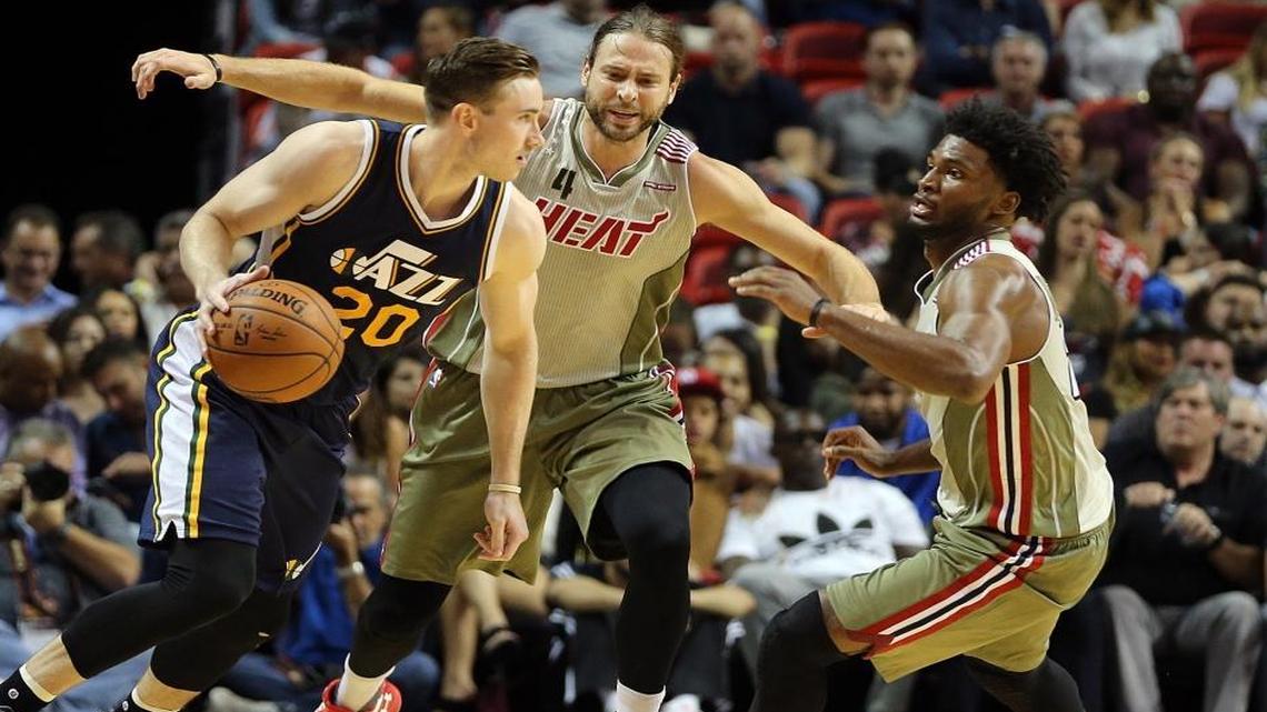 Miami Heat's Josh McRoberts and Justise Winslow defend against Utah's Gordon Hayward, 20, in the fourth quarter of the Miami Heat and Utah Jazz game at AmericanAirlines Arena in Miami on Thurs., Nov. 12, 2015.