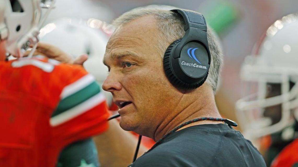 Miami Hurricanes head coach Mark Richt speaks with quarterback Brad Kaaya (15) on the sidelines in the third quarter as the University of Miami hosts Pittsburgh at Hard Rock Stadium on Sat., Nov. 5, 2016.