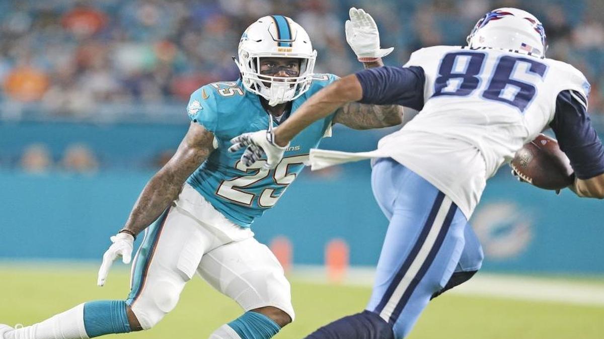 Miami Dolphins cornerback Xavien Howard (25) chases Tennessee Titans wide receiver Andrew Turzilli (86) in the second quarter as the Miami Dolphins host the Tennessee Titans at Hard Rock Stadium on Thurs., Sept. 1, 2016.