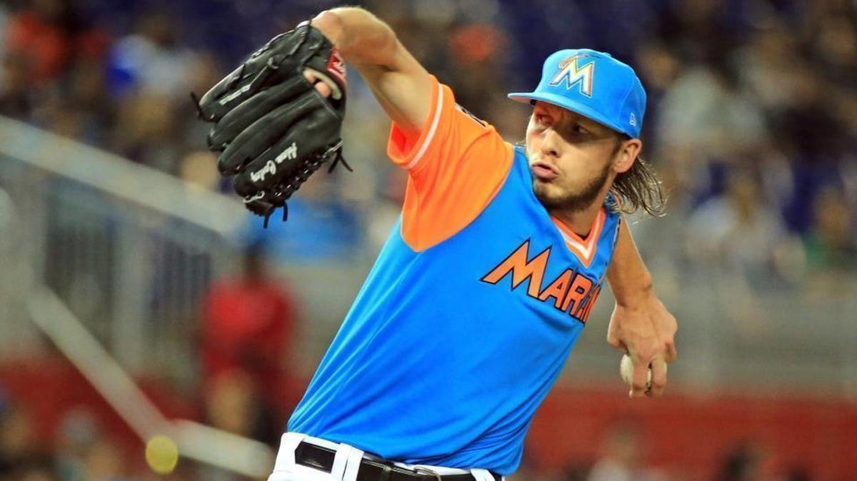 Miami Marlins starting pitcher Adam Conley (61) pitches against the Padres last August. The Marlins want to see his velocity improve.