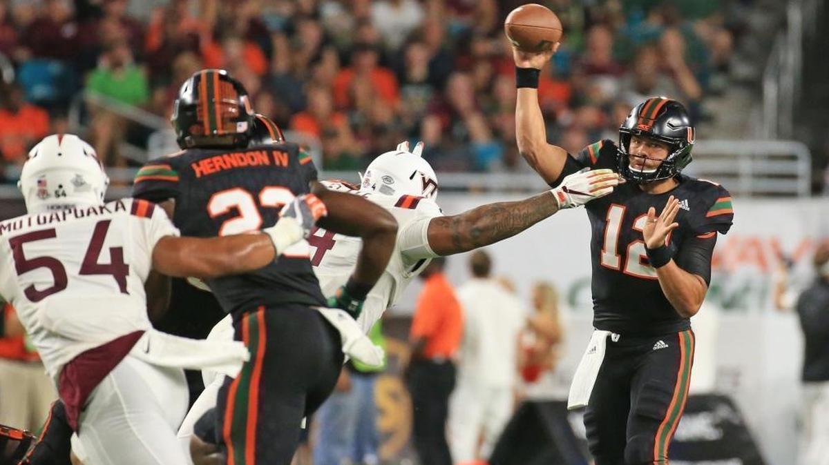 Miami Hurricanes quarterback Malik Rosier (12) throws in the first quarter as the University of Miami hosts Virginia Tech Hokies at Hard Rock Stadium on Saturday, November 4, 2017.