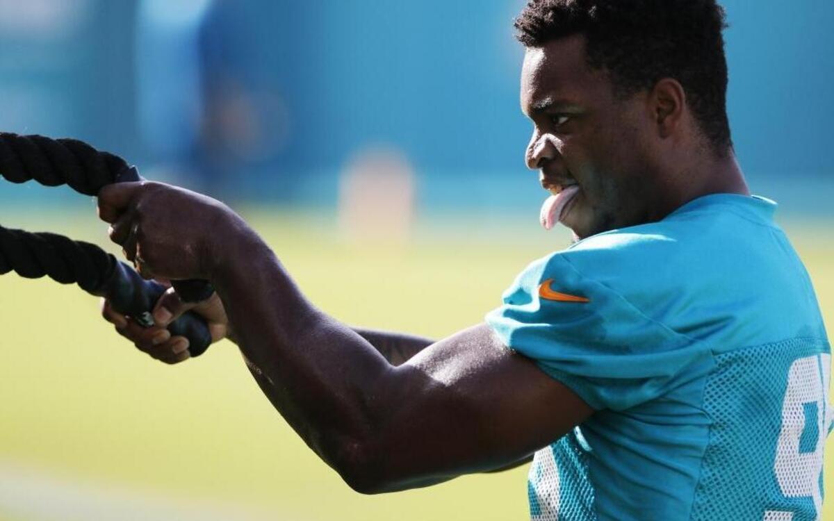 Miami Dolphins defensive end Dion Jordan (95) trains on the sidelines during day three of the Miami Dolphins training camp held at the Dolphins Training Facility on Sun., July 31, 2016.