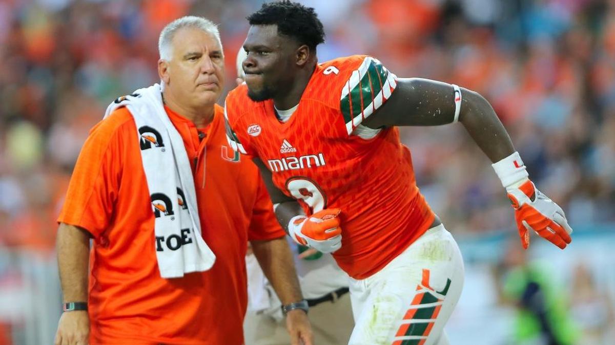 University of Miami Hurricanes defensive linemen Chad Thomas walks off the field after being injured in a play in the second quarter of an NCAA college football game against FAU Owls, Saturday Sept. 10, 2016, in Miami Gardens.