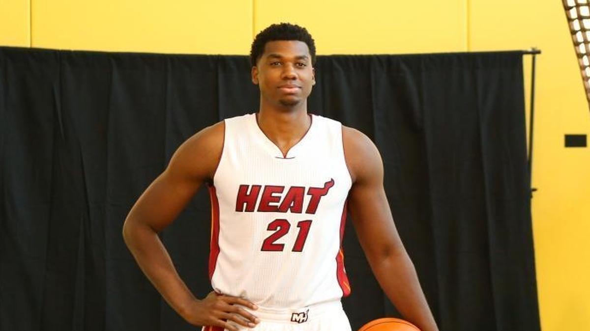 Miami Heat center Hassan Whiteside poses for photographers during the Media Day for the 2016-17 NBA season at AmericanAirlines Arena in Miami on Mon., Sept. 26, 2016.