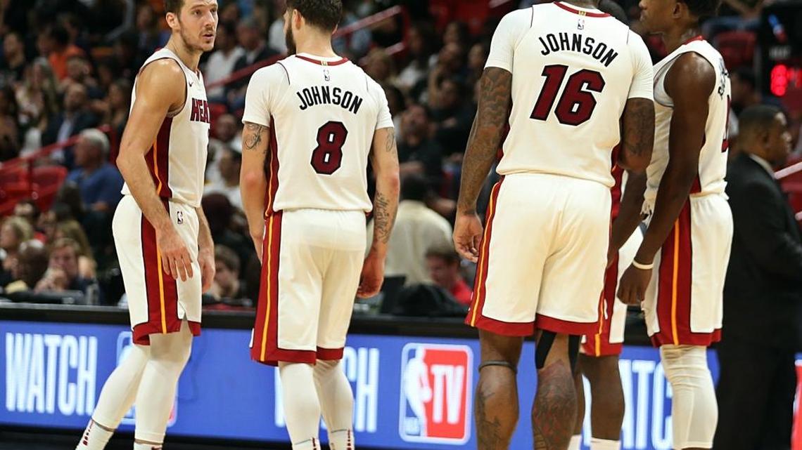 Miami Heat Goran Dragic, Tyler Johnson, James Johnson and Josh Richardson during the fourth quarter of the Miami Heat vs San Antonio Spur game on Oct. 25. Johnson and Johnson - two key pieces on that bench - have dramatically lower plus/minus numbers so far this season.