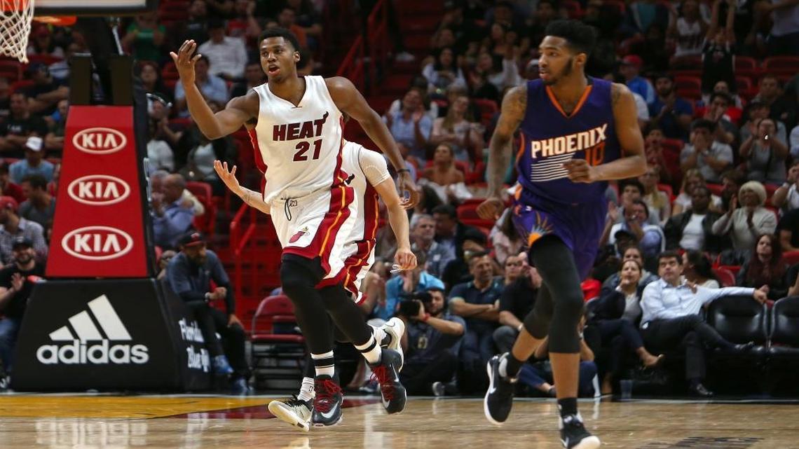 Miami Heat center Hassan Whiteside reacts after a play during the fourth quarter of an NBA basketball game against the Phoenix Suns at AmericanAirlines Arena in Miami on Tues., March 21, 2017.