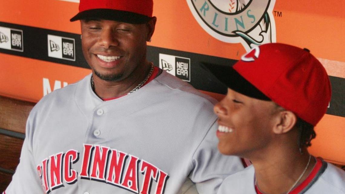 (6/9/08 Photo/Jeffrey M. Boan, El Nuevo Herald) Reds Ken Griffey Jr. shares a moment with his son Trey after hitting his 600th career home run against Marlins pitcher Mark Hendrickson during 1st inning action. Trey Griffey went on to be a receiver at Arizona and signed with the Dolphins on Tuesday.