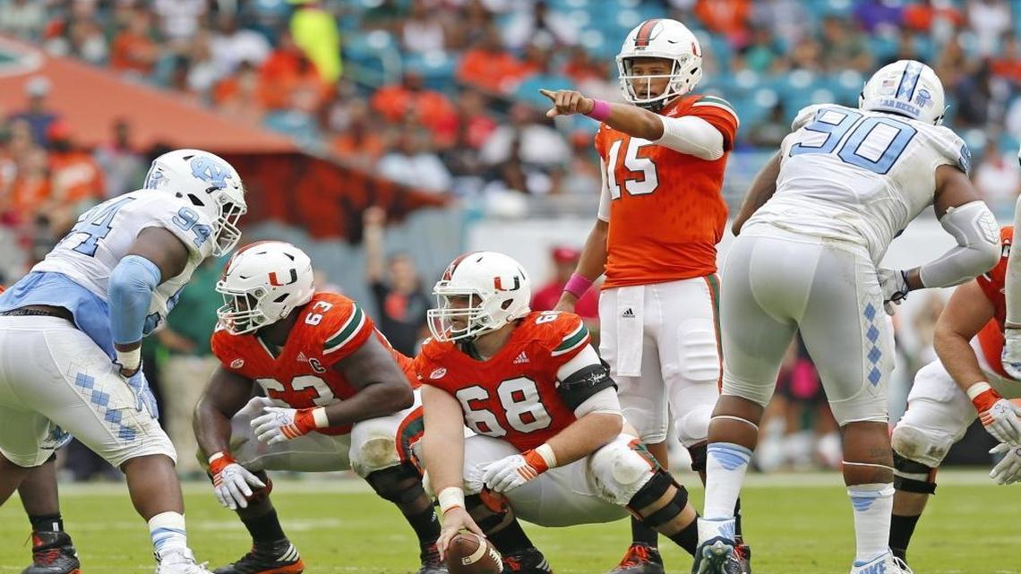 Miami Hurricanes quarterback Brad Kaaya (15) gestures at the line of scrimmage in the first quarter as the University of Miami Hurricanes host the University of North Carolina Tar Heels at Hard Rock Stadium on Sat., Oct. 15, 2016.