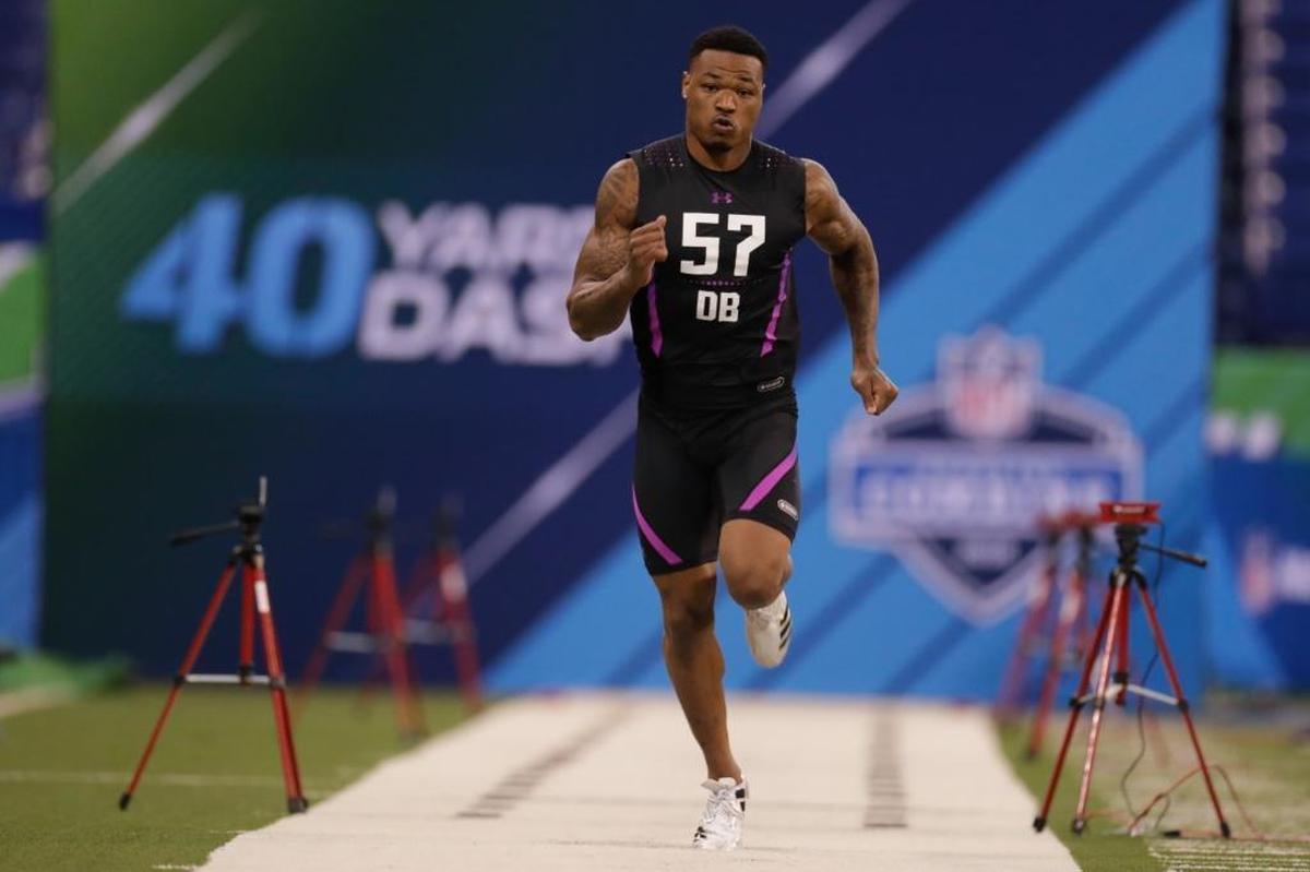 ESPN’s Mel Kiper has the Dolphins drafting Florida State safety Derwin James, shown running the 40-yard dash at the NFL football scouting combine in Indianapolis in March.