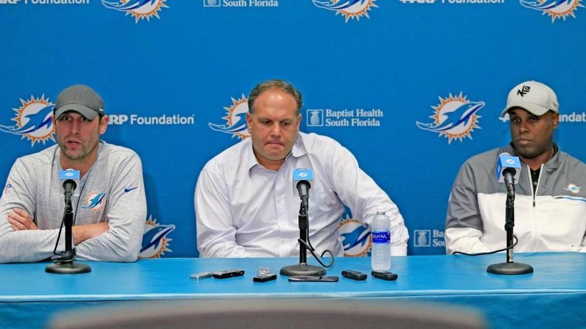 Dolphins coach Adam Gase, Executive Vice President of Football Operations Mike Tannenbaum and General Manager Chris Grier, left to right, during a news conference in January.