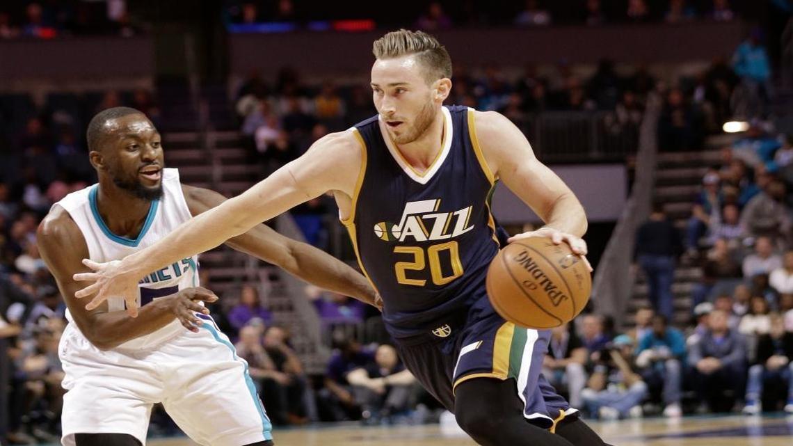Utah Jazz's Gordon Hayward (20) drives past Charlotte Hornets' Kemba Walker (15) during the first half of an NBA basketball game in Charlotte, N.C., Wednesday, Nov. 9, 2016.
