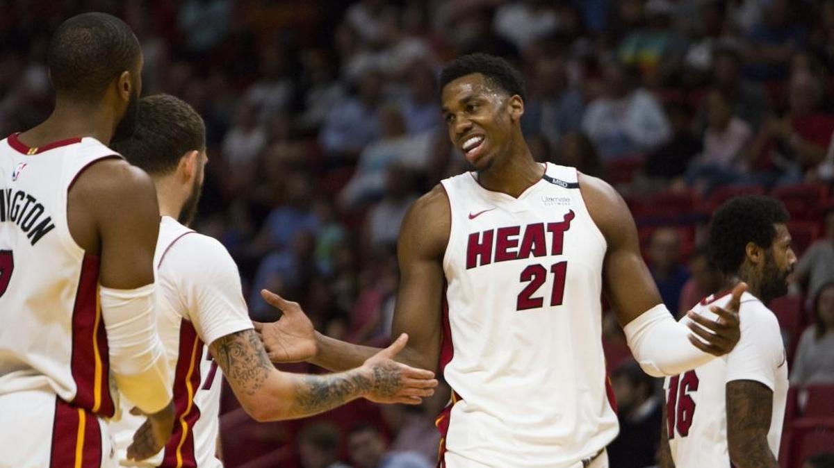 Miami Heat center Hassan Whiteside (21) reacts to a play during the first quarter of Tuesday’s win against Atlanta, which clinched a playoff berth for the Heat.
