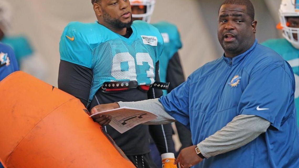 Dolphins defensive lineman coach Terret Williams and Ndamukong Suh (93) at the Miami Dolphins training facility in Davie, FL, August 28, 2017.