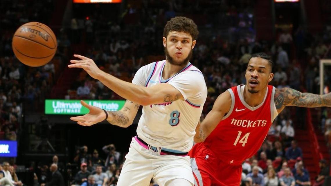 Miami Heat guard Tyler Johnson passes the ball against Houston Rockets guard Gerald Green during a game on Feb. 7, 2018. Johnson’s salary rises dramatically the next two seasons.