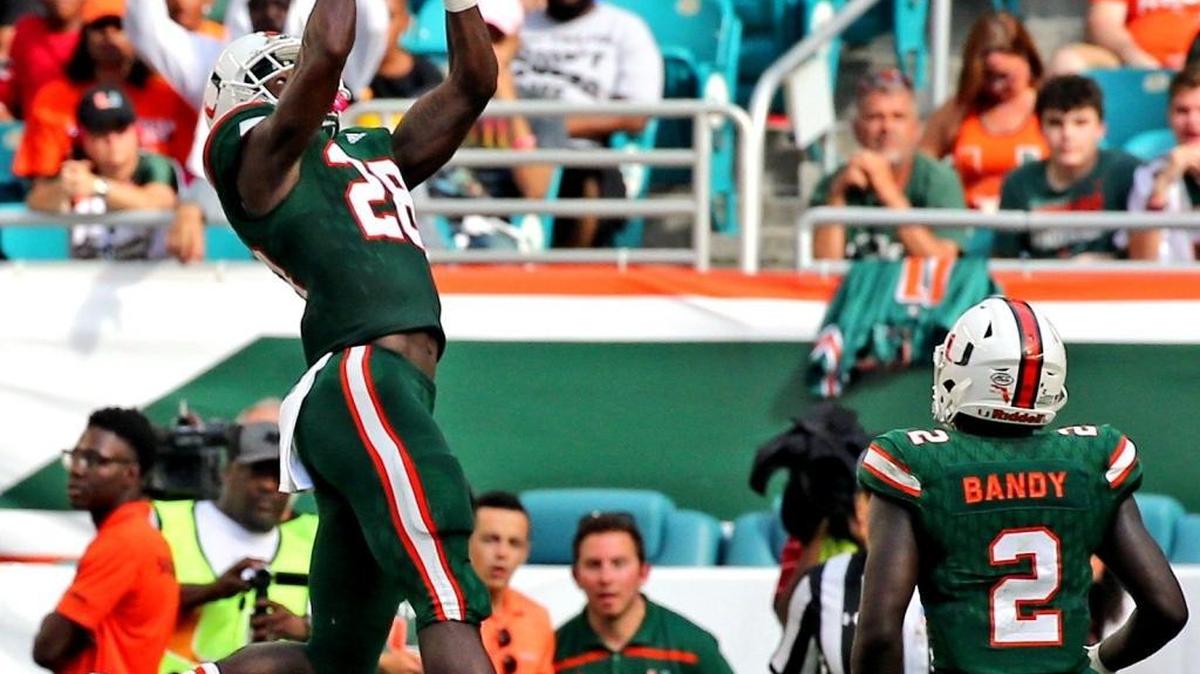 Miami Hurricanes Michael Jackson (28) catches a first quarter interception as they play Syracuse University at Hard Rock Stadium in Miami Gardens, Florida, October 21, 2017.
