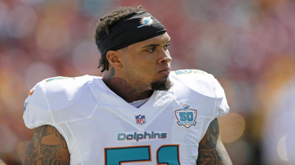 Miami Dolphins center Mike Pouncey (51) before the start of the game. The Washington Redskins host the Miami Dolphins at FedExField in Landover, Maryland on Sun., Sept. 13, 2015.