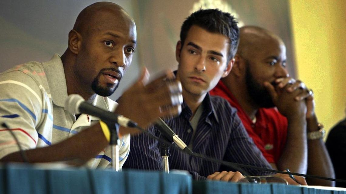 Miami Heat's Alonzo Mourning speaks during the Youth Summit at his annual Summer Groove Saturday at Jungle Island. In the center is sportscaster Adam Kuperstein and on the right is Ed Lover, formerly of MTV's Yo MTV Raps.
