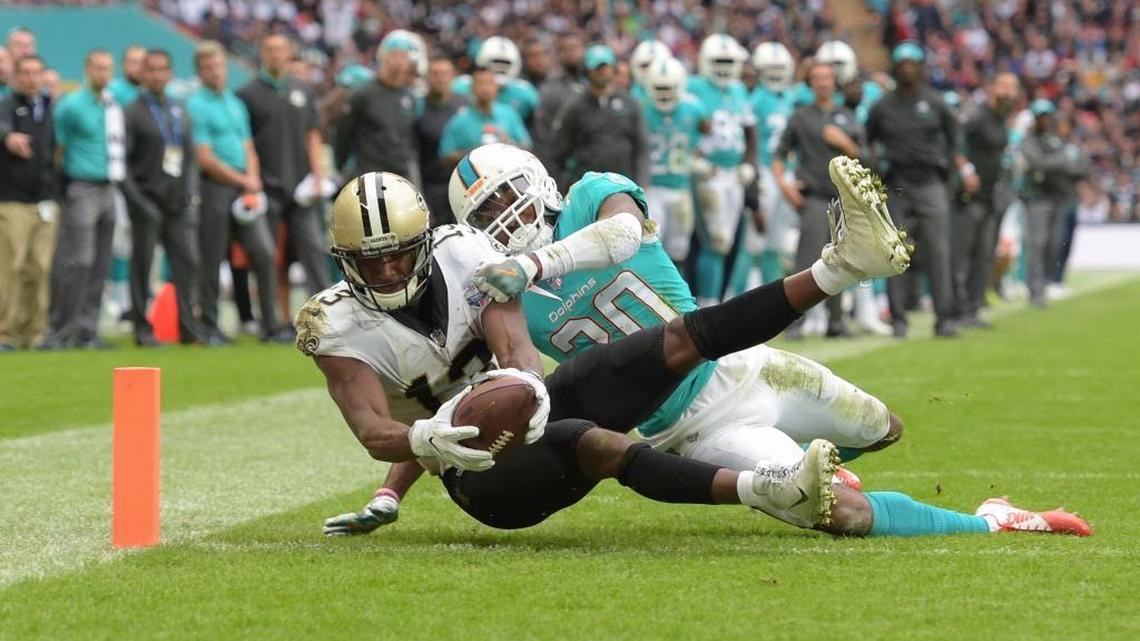 Miami Dolphins cornerback Cordrea Tankersley (30) is unable to stop New Orleans Saints wide receiver Michael Thomas (13) from scoring a touchdown on Sunday, Oct. 1, 2017 at Wembley Stadium in London, England. (Joe Toth/Rex Shutterstock/Zuma Press/TNS) Source: NFL Communications