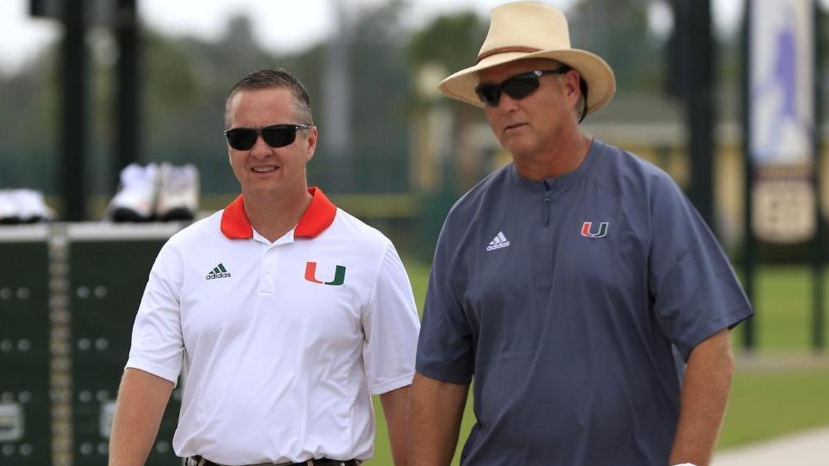 Head coach Mark Richt, right, walks with athletic director Blake James after practice as the Miami Hurricanes held practice in September at ESPN’s Wide World of Sports at Walt Disney World.