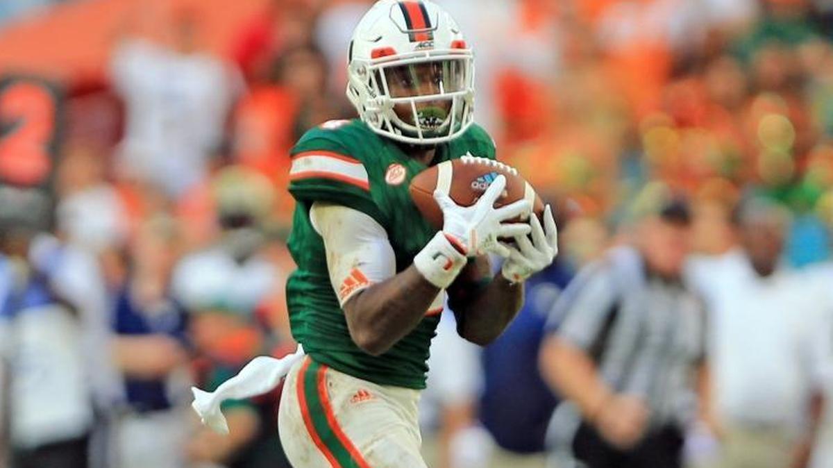 Miami Hurricanes wide receiver Jeff Thomas (4) on a long reception in the third quarter as the University of Miami hosts Georgia Tech at Hard Rock Stadium on Sat., Oct. 14, 2017.