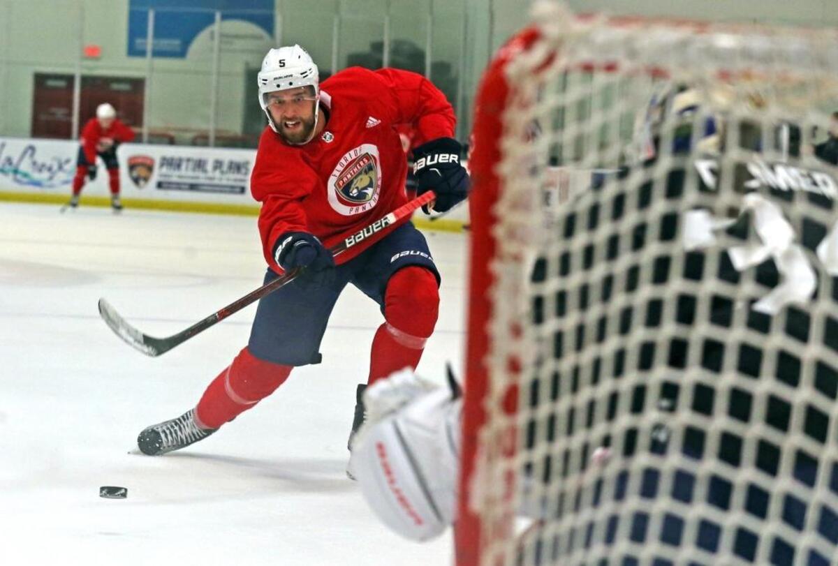 Florida Panthers Aaron Ekblad shoots for the goal during the teams first practice of the season at the Ice Den Sports complex in Coral Springs, Sept. 15, 2017.