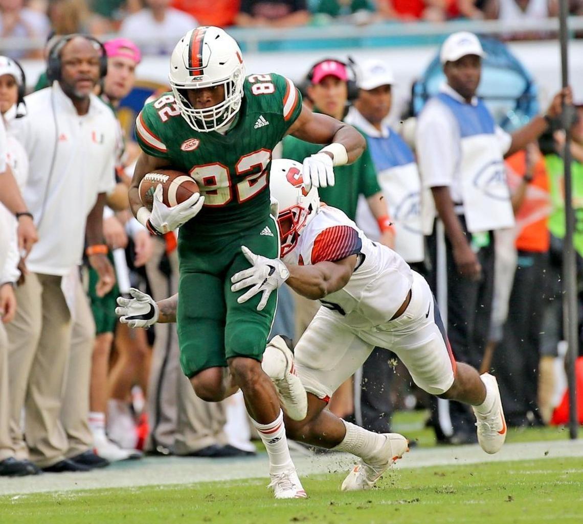 Miami Hurricanes receiver Ahmmon Richards (82) catches a second quarter pass against Syracuse last October. Richards is coming off a knee injury sustained in practice before last season’s ACC championship game.
