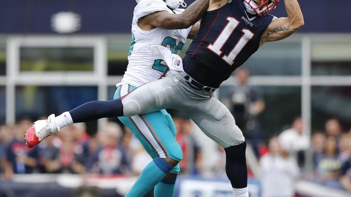 Miami Dolphins cornerback Xavien Howard (25) defends against the New England Patriots wide receiver Julian Edelman (11) on an incomplete pass in the second quarter as the New England Patriots host the Miami Dolphins at Gillette Stadium on Sunday, September 18, 2016.