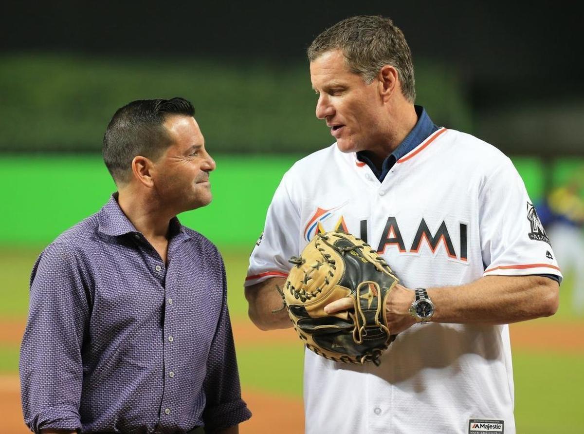 Former Marlins president David Samson and former Marlins outfielder and special assistant Jeff Conine, seen here before an August 2017 game, will run seven marathons in seven days on seven continents beginning next Tuesday.