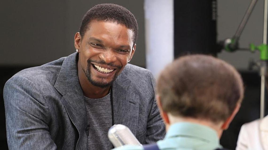 On Monday, April 3, 2017 NBA All-Star, Chris Bosh, left, smiles during his interview with famed talk show host/TV journalist Larry King, right, at the Loews Miami Beach hotel. King taped two programs for his current Larry King Now show on Monday,