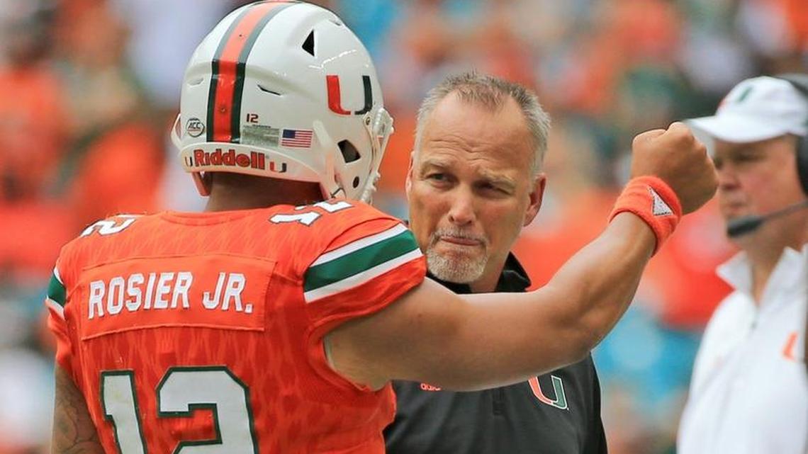 UM head coach Mark Richt talks with quarterback Malik Rosier on the sideline during a game last year. These are the two primary caretakers of the Hurricanes’ high expectations entering the 2018 season.