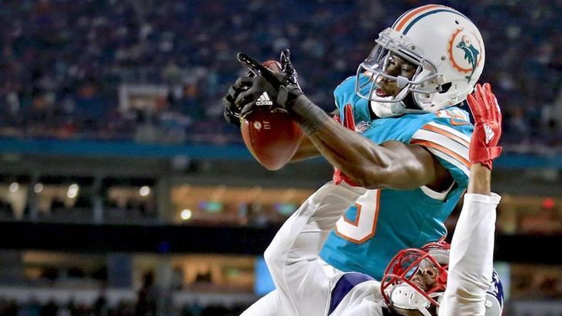 Miami Dolphins wide receiver Jakeem Grant (19) makes a reception against New England Patriots cornerback Malcolm Butler (21) during their Dec. 11 Monday Night Football game.