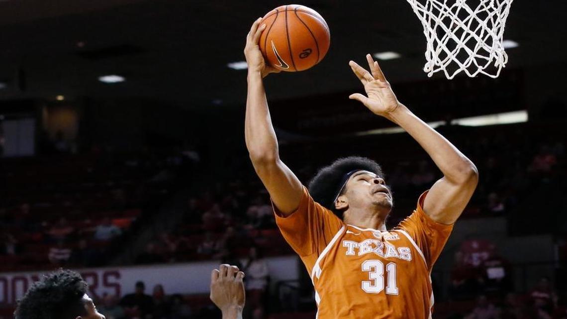 Texas forward Jarrett Allen (31) shoots in front of Oklahoma guard Christian James (3) during the first half of an NCAA college basketball game in Norman, Okla. Allen is a one-and-done post player prospect in Thursday's NBA Draft.