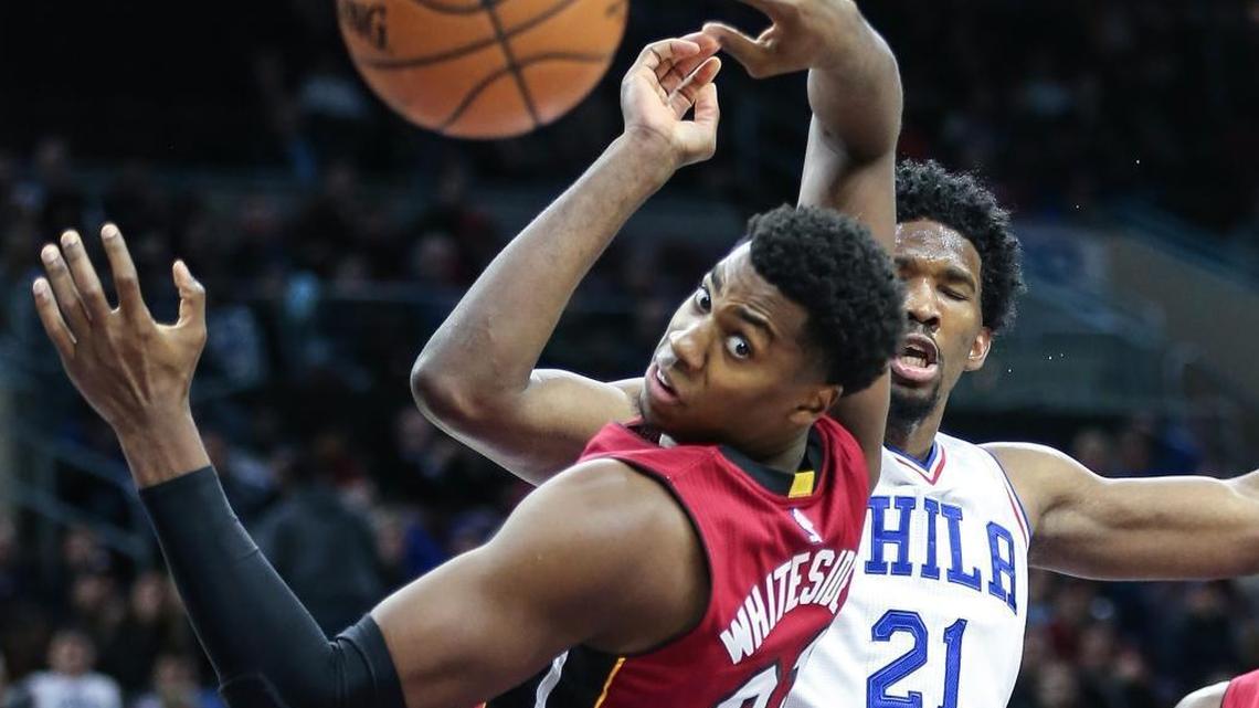 Philadelphia 76ers center Joel Embiid and the Miami Heat's Hassan Whiteside watch a loose ball during a game in November 2016. Since then, they exchanged insults on Twitter last November. And they meet on the court on Friday, Feb. 2, 2018.