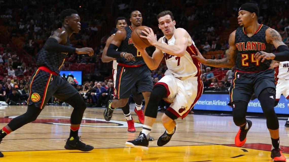 Miami Heat guard Goran Dragic drives against Atlanta Hawks forward Kent Bazemor (24) during the third quarter of an NBA basketball game at AmericanAirlines Arena in Miami on Wed., Feb. 1, 2017.