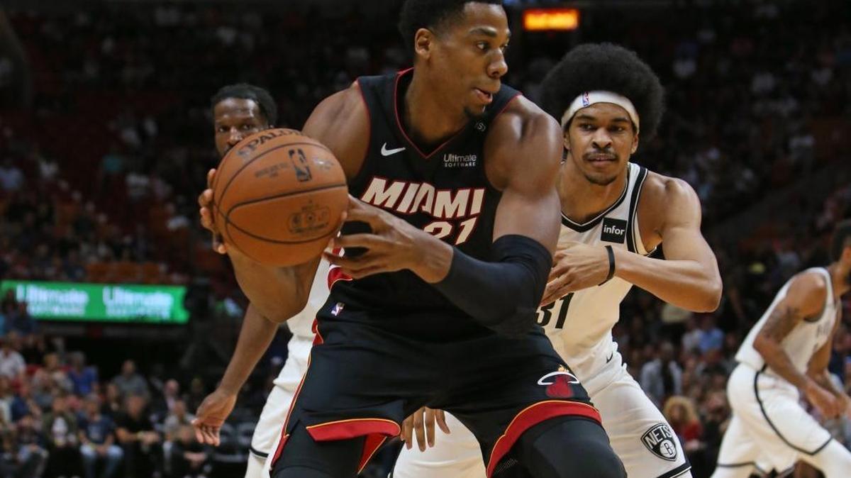 Heat center Hassan Whiteside, seen here driving around Brooklyn Nets center Jarrett Allen on Saturday, indicated he’s fed up with his diminished playing time this season.