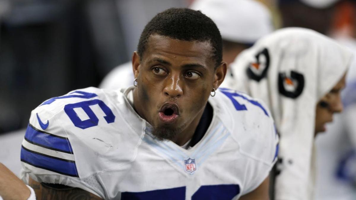 
In this Aug. 29, 2015, file photo, Dallas Cowboys defensive end Greg Hardy (76) talks with teammates on the sideline during a preseason NFL football game against the Minnesota Vikings in Arlington, 
