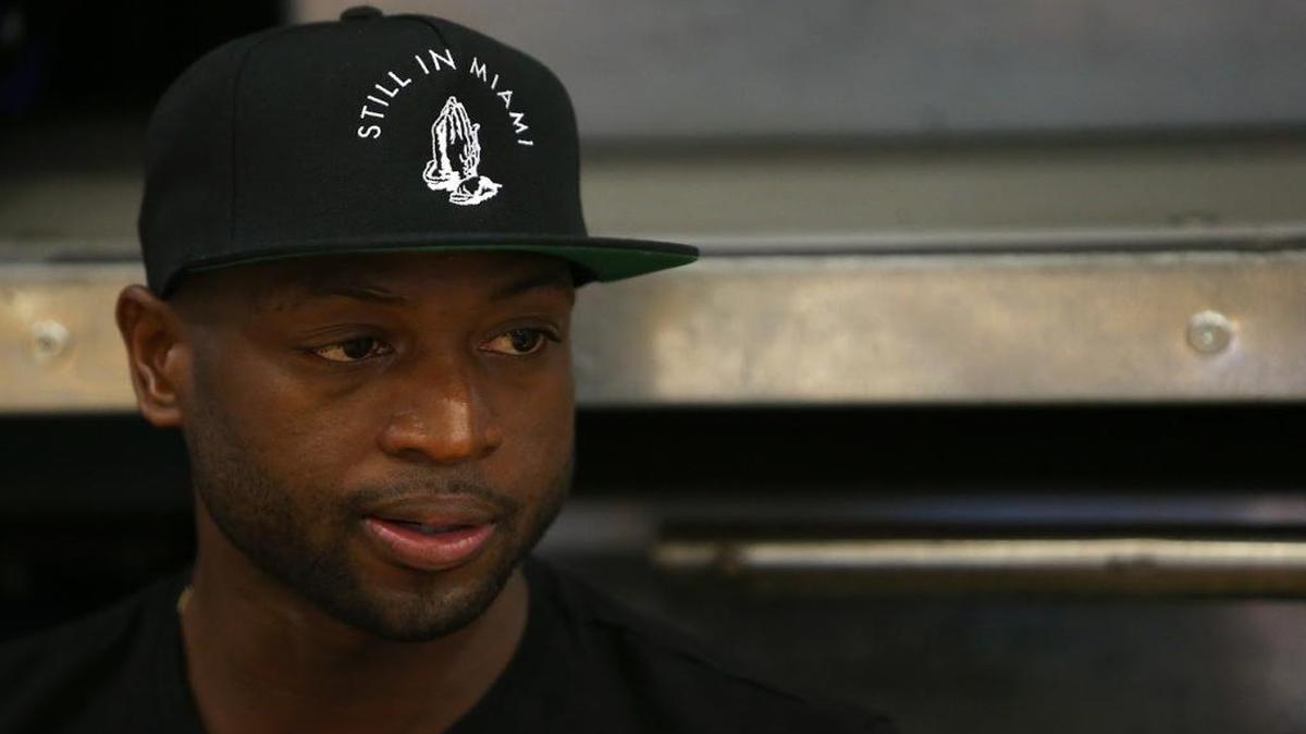 Dwyane Wade is now the former guard of the Miami Heat - despite what his hat says in this 2015 training camp photo. And, for some in Miami, that fact is going to be hard to accept.