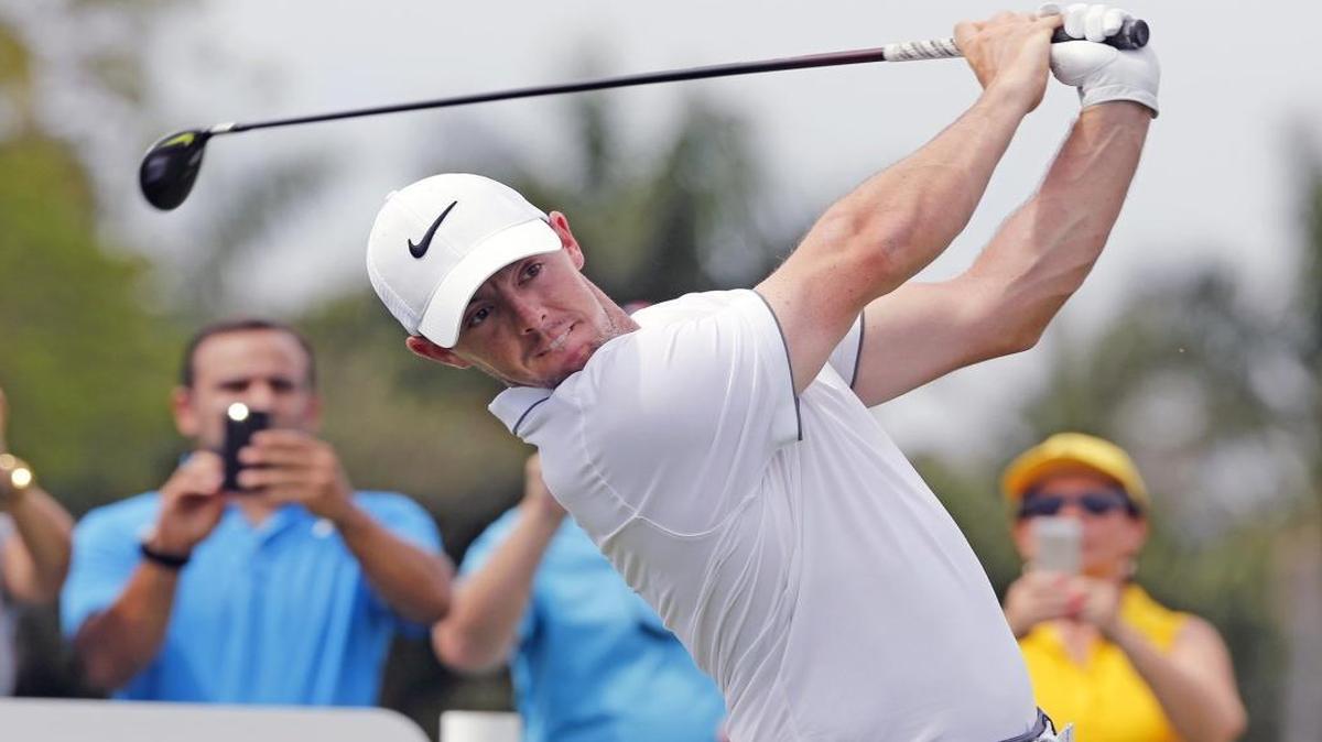 Rory McIlroy tees off on the 11th hole as he plays a practice round at the 2016 WGC-Cadillac Championship at Trump National Doral, in Miami, Florida, March 2, 2016.