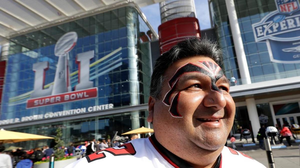 John Moreno shows his support for the Atlanta Falcons outside the NFL Experience for the NFL Super Bowl 51 football game Friday, Feb. 3, 2017, in Houston.
