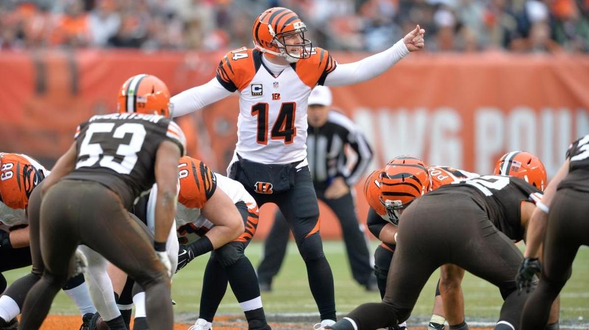 Cincinnati Bengals quarterback Andy Dalton signals a play in the second quarter against the Cleveland Browns on Sunday, Dec. 14, 2014, in Cleveland.