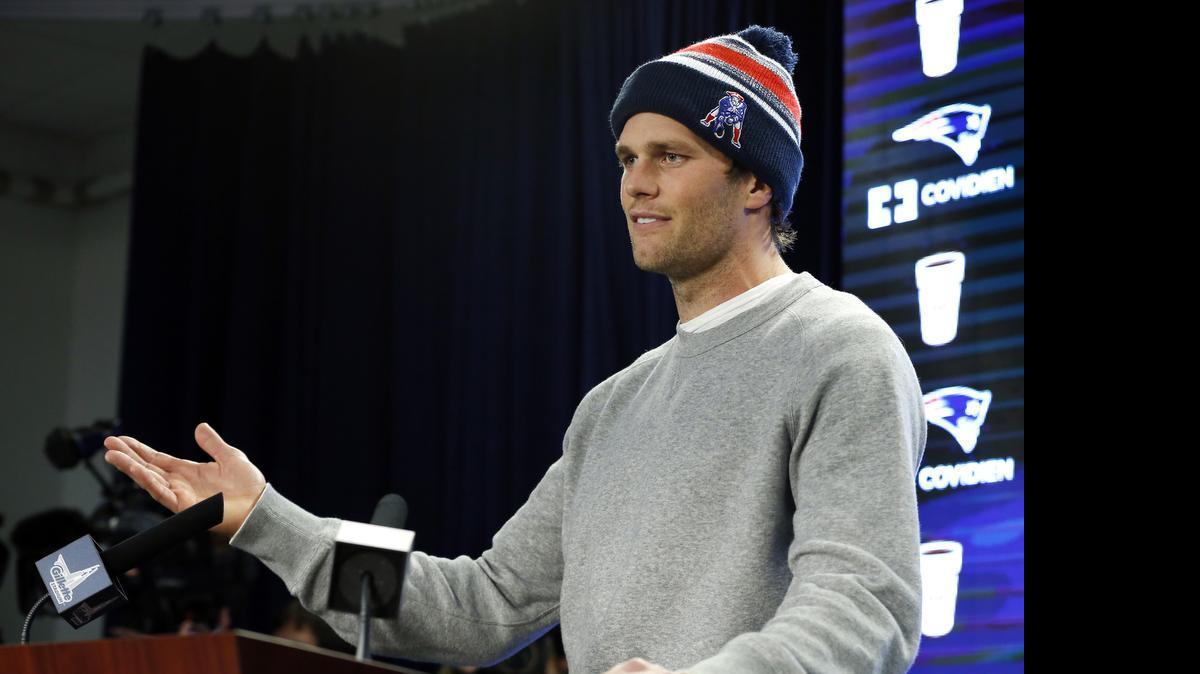 
New England Patriots quarterback Tom Brady speaks at a news conference about the NFL investigation into deflated footballs, in Foxborough, Mass., on Jan. 22, 2015. 
