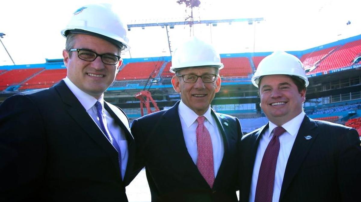 Miami Dolphins CEO Tom Garfinkel, left, owner Stephen Ross ,center, and Dolphins vice chairman Matt Higgins give a tour of renovations to Sun Life Stadium on Friday, Jan. 16, 2014 in Miami Gardens.