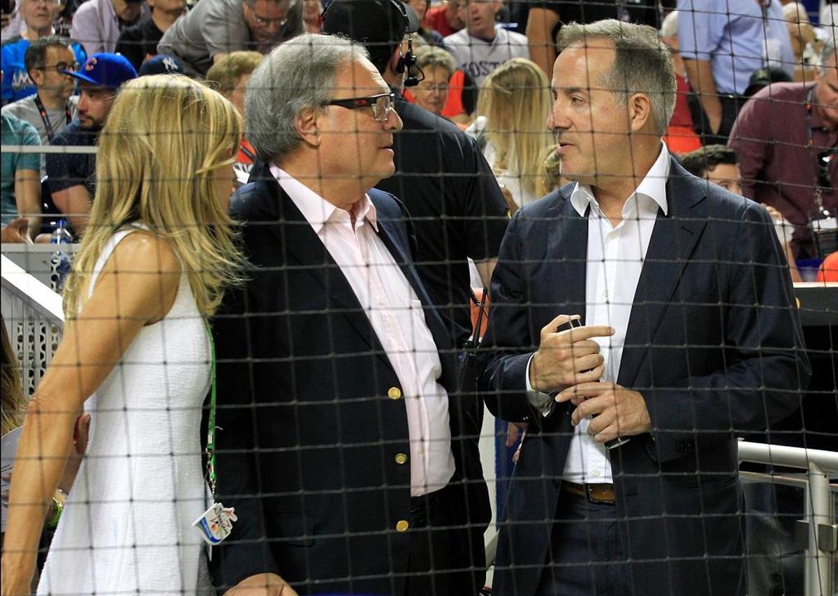 Miami Marlins owner Jeffrey Loria, center, and his wife July, chat with Cuban-American billionaire Jorge Mas, one of the bidders to buy the Miami Marlins talk during the All-Star game on Tuesday, July 11, 2017, at Marlins Park in Miami.
