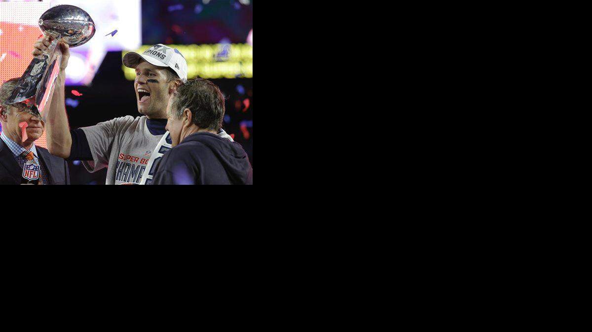 New England Patriots quarterback Tom Brady holds up Vince Lombardi Trophy after the Patriots defeated the Seattle Seahawks 28-24 in NFL Super Bowl XLIX football game Sunday, Feb. 1, 2015, in Glendale, Ariz.