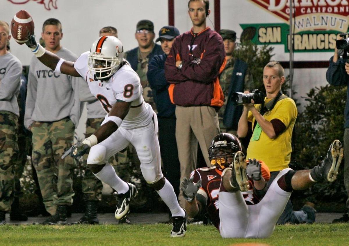 UM's Darnell Jenkins scores in the third quarter on a Kyle Wright pass in the endzone.