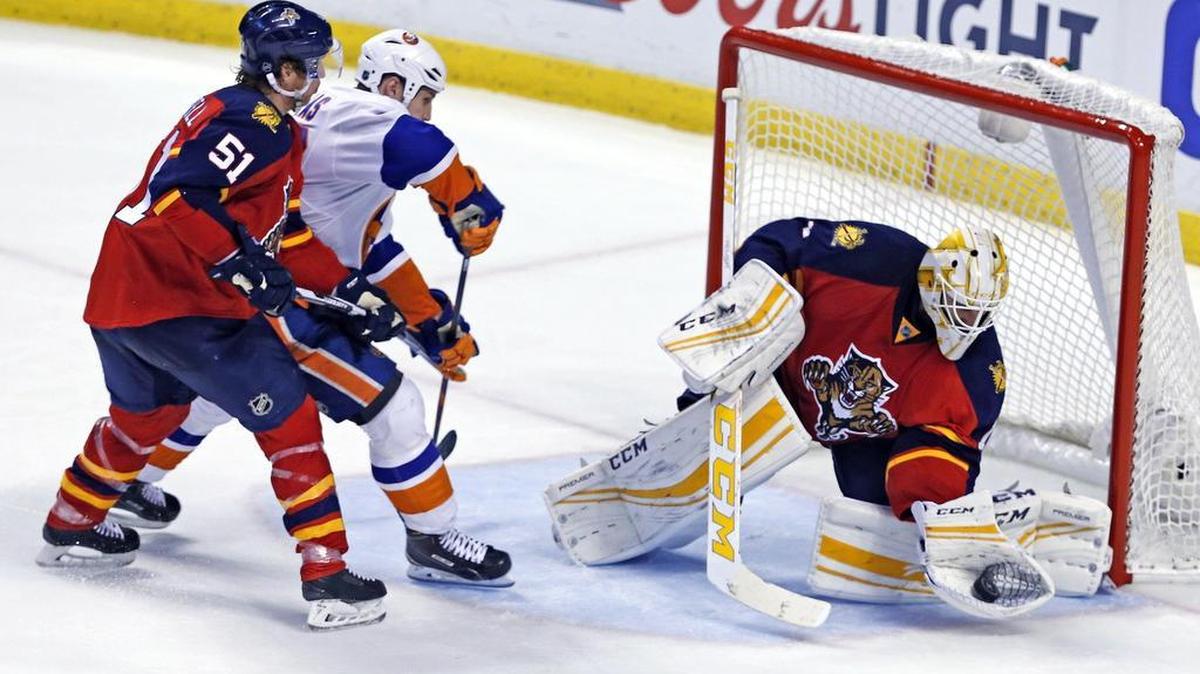 Florida Panthers goalie Roberto Luongo works to protect the goal in the final minutes of the third period as they play the New York Islanders in Game 2 of the first round of the 2016 NHL Stanley Cup Playoffs at the BB&T Center in Sunrise, Florida, Fri., April 15, 2016.