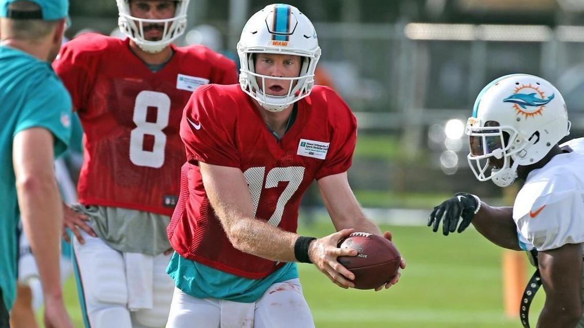 Miami Dolphins quarterbacks Matt Moore (8) and Ryan Tannehill (17) during training camp at the Miami Dolphins training facility in Davie on Aug. 3, 2017.