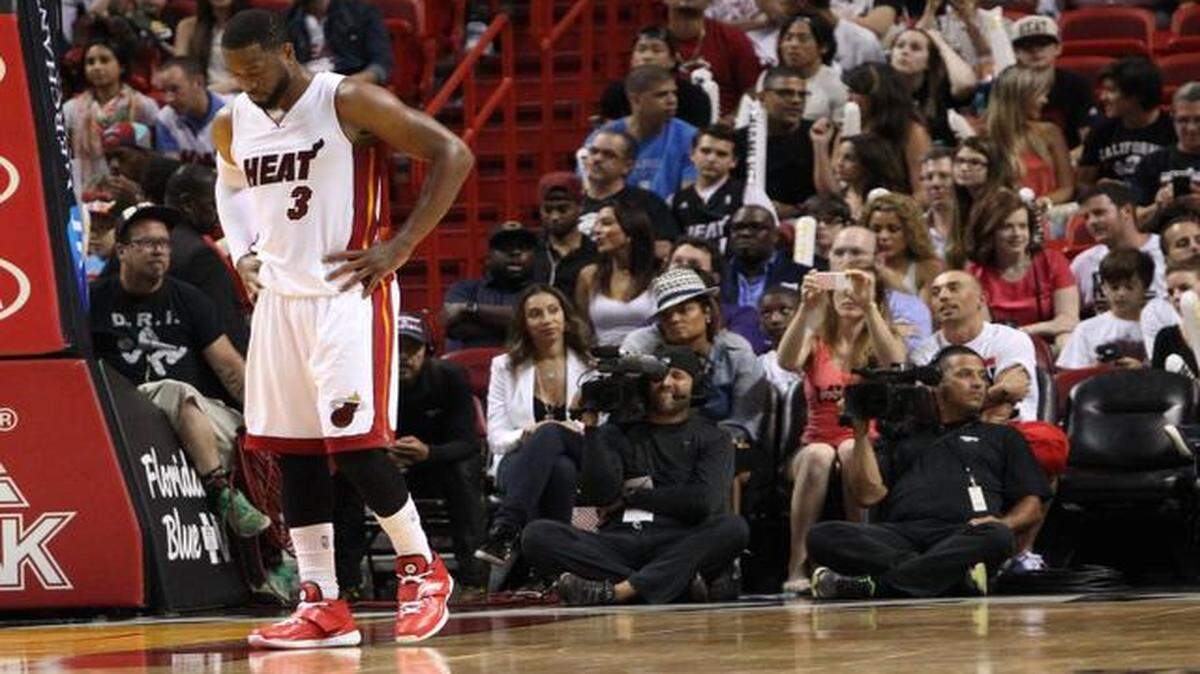 
Dwyane Wade reacts in the fourth quarter during the Miami Heat’s game against the Orlando Magic at AmericanAirlines Arena on Monday, April 13, 2015.
