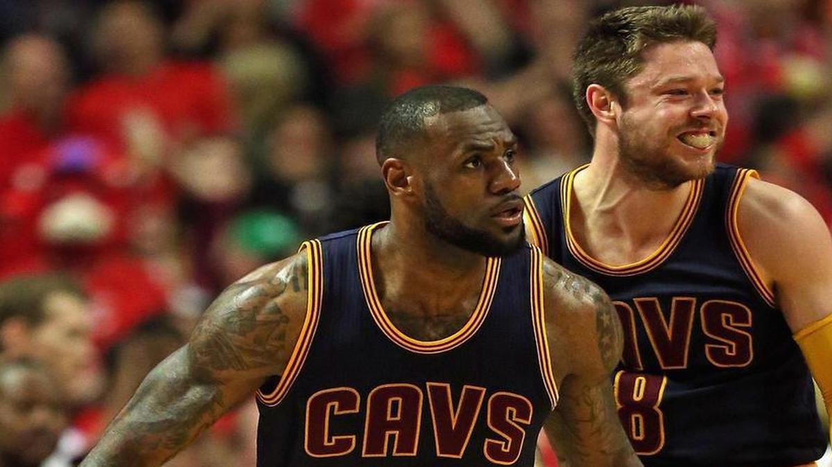 
LeBron James, left, and Matthew Dellavedova of the Cleveland Cavaliers celebrate after James hit the winning shot at the buzzer for an 86-84 win over the Chicago Bulls in Game 4 of the Eastern Conference semifinals May 10, 2015 in Chicago. 
