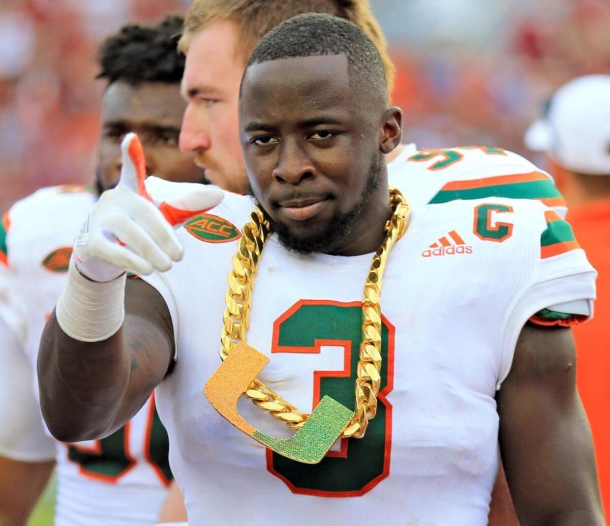 Miami Hurricanes defensive back Dee Delaney (3) with the turnover chain after intercepting a pass as the Seminoles host the Miami Hurricanes at Doak Campbell Stadium in Tallahassee on Saturday, Oct. 7, 2017.